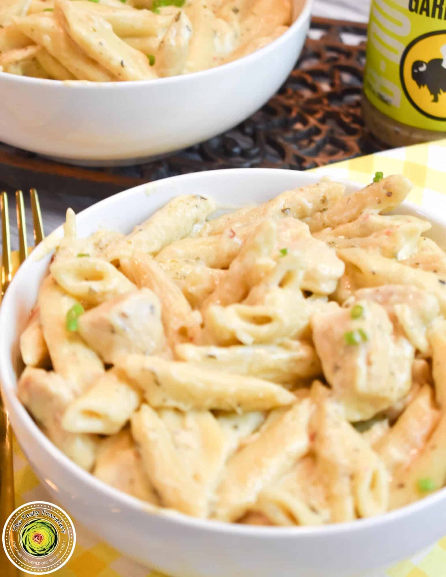 Instant Pot Parmesan Garlic Chicken Pasta showing creamy garlic parmesan sauce coating the pasta