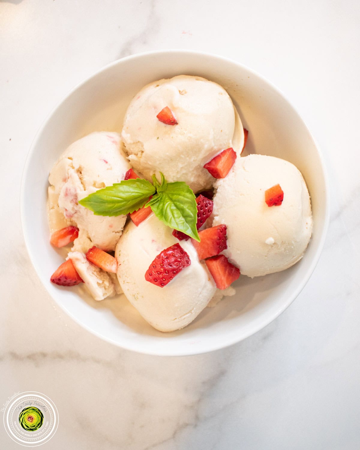 Scooped Ninja Creami strawberry basil goat cheese protein ice cream with visible strawberry pieces