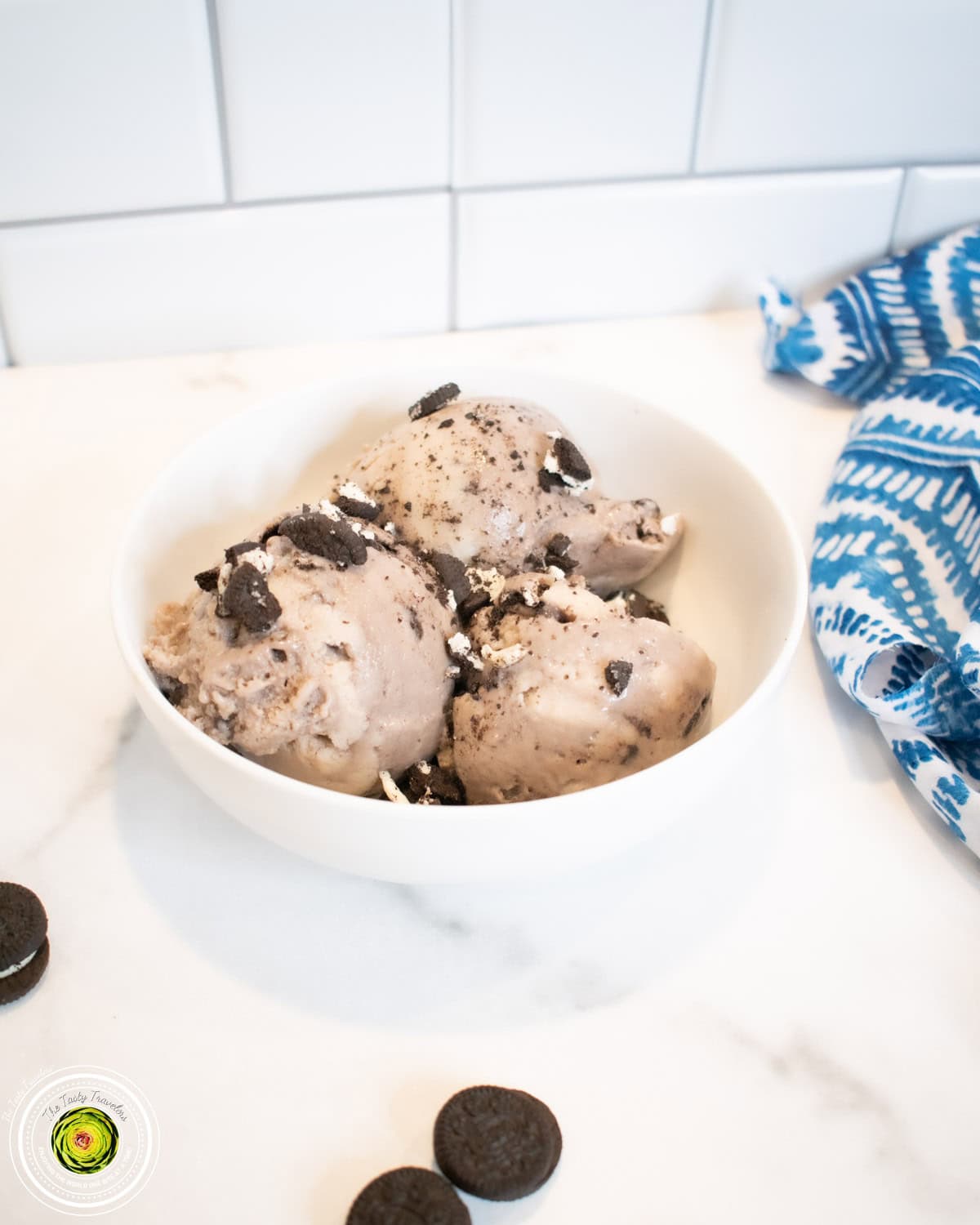 Ninja Creami Cookies and Cream Protein Ice Cream showing Oreo pieces mixed throughout the vanilla base
