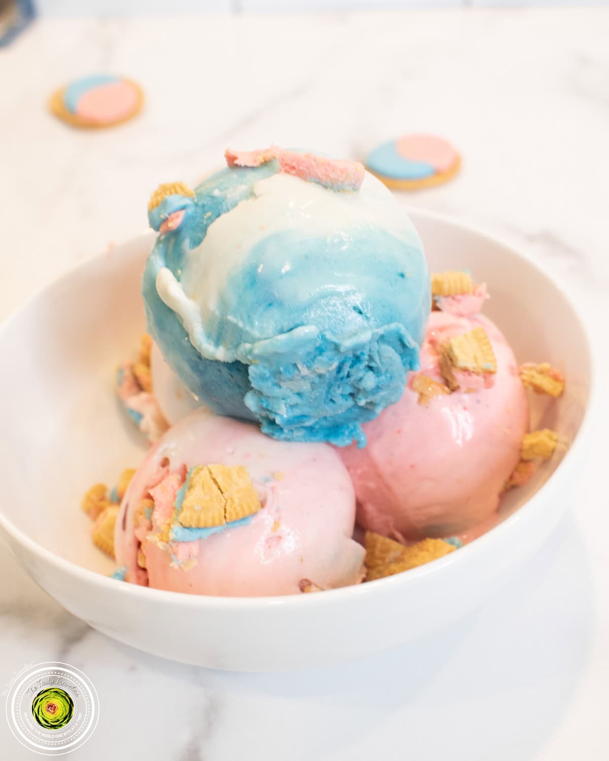 Ninja Creami cotton candy protein ice cream in a pint container with pink, white, and blue colors