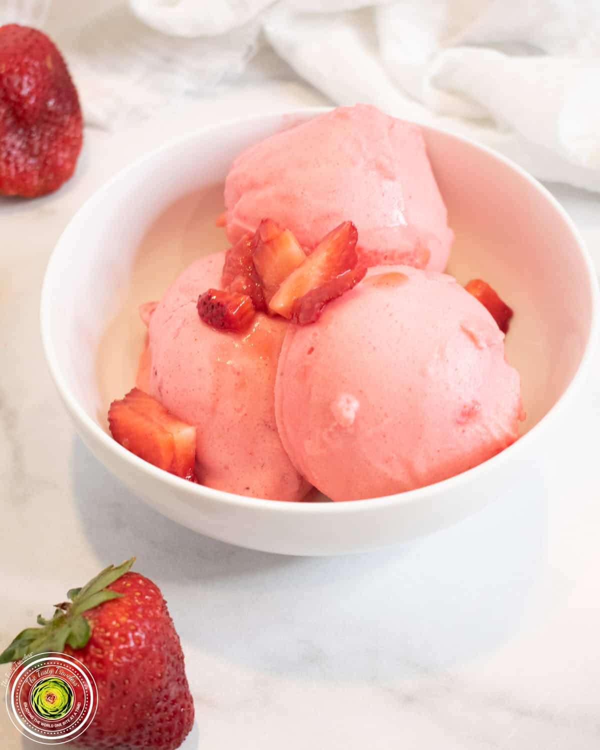 Scooped Ninja Creami super strawberry protein ice cream with visible strawberry pieces