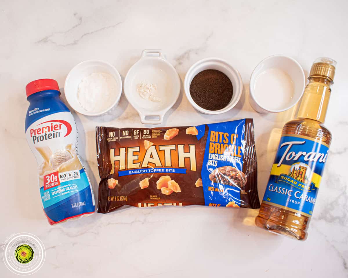 Ingredients for Ninja Creami toffee coffee protein ice cream including vanilla protein shake, espresso powder, and Heath chips