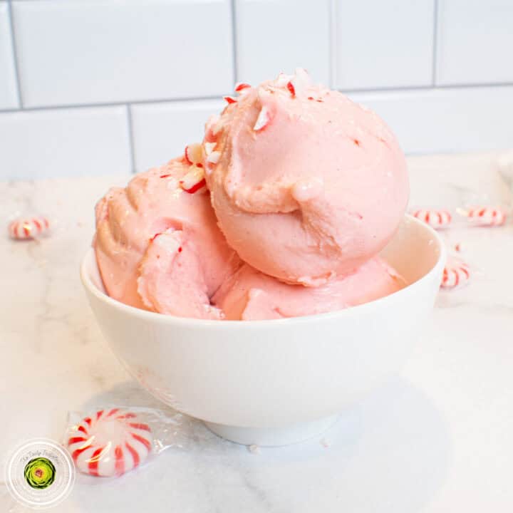 Delicious peppermint protein ice cream served in a white bowl, perfect for a healthy treat.