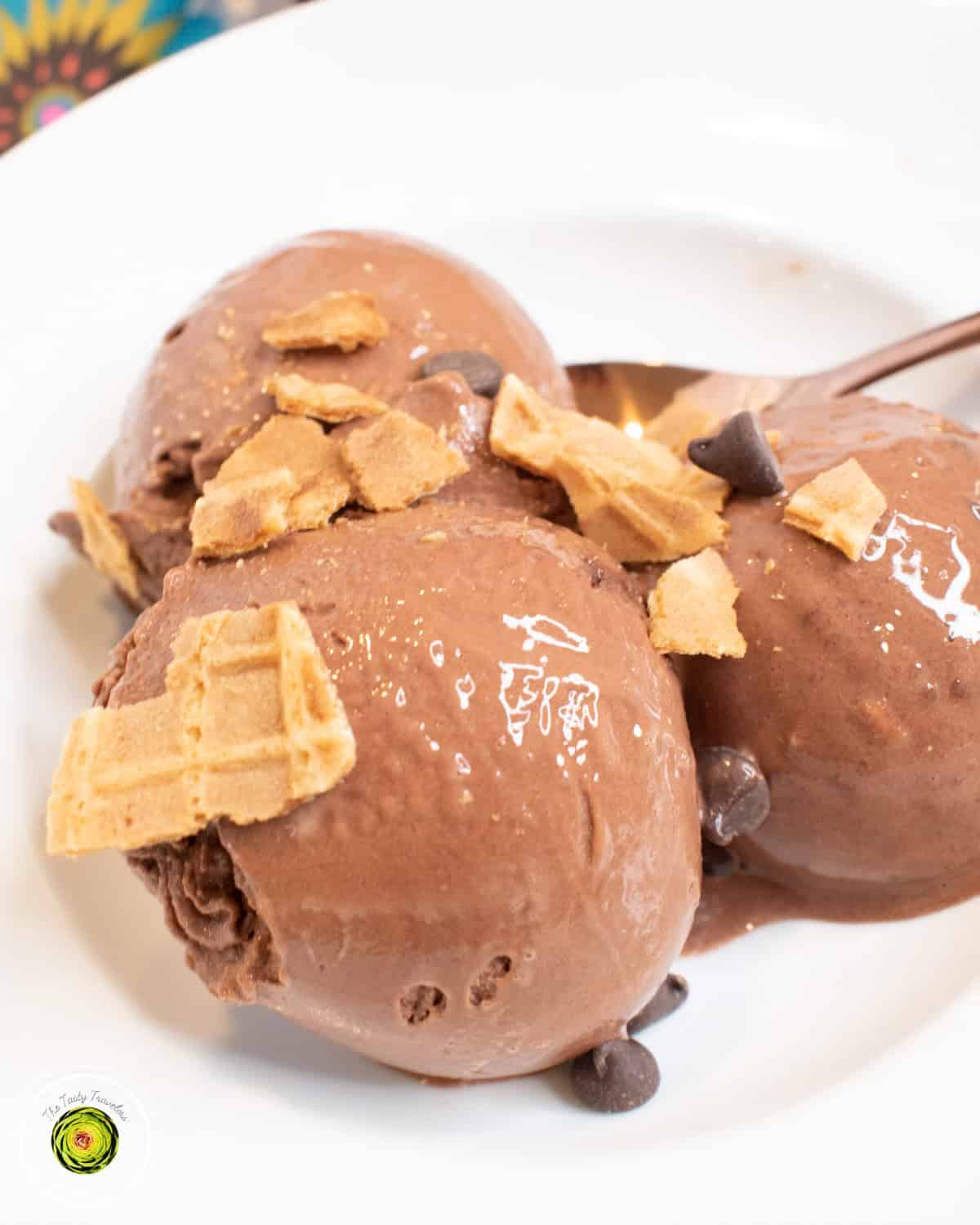 Ninja Creami Caramel Fudge Waffle Cone Protein Ice Cream ingredients laid out including Skinny Syrup caramel fudge waffle cone syrup