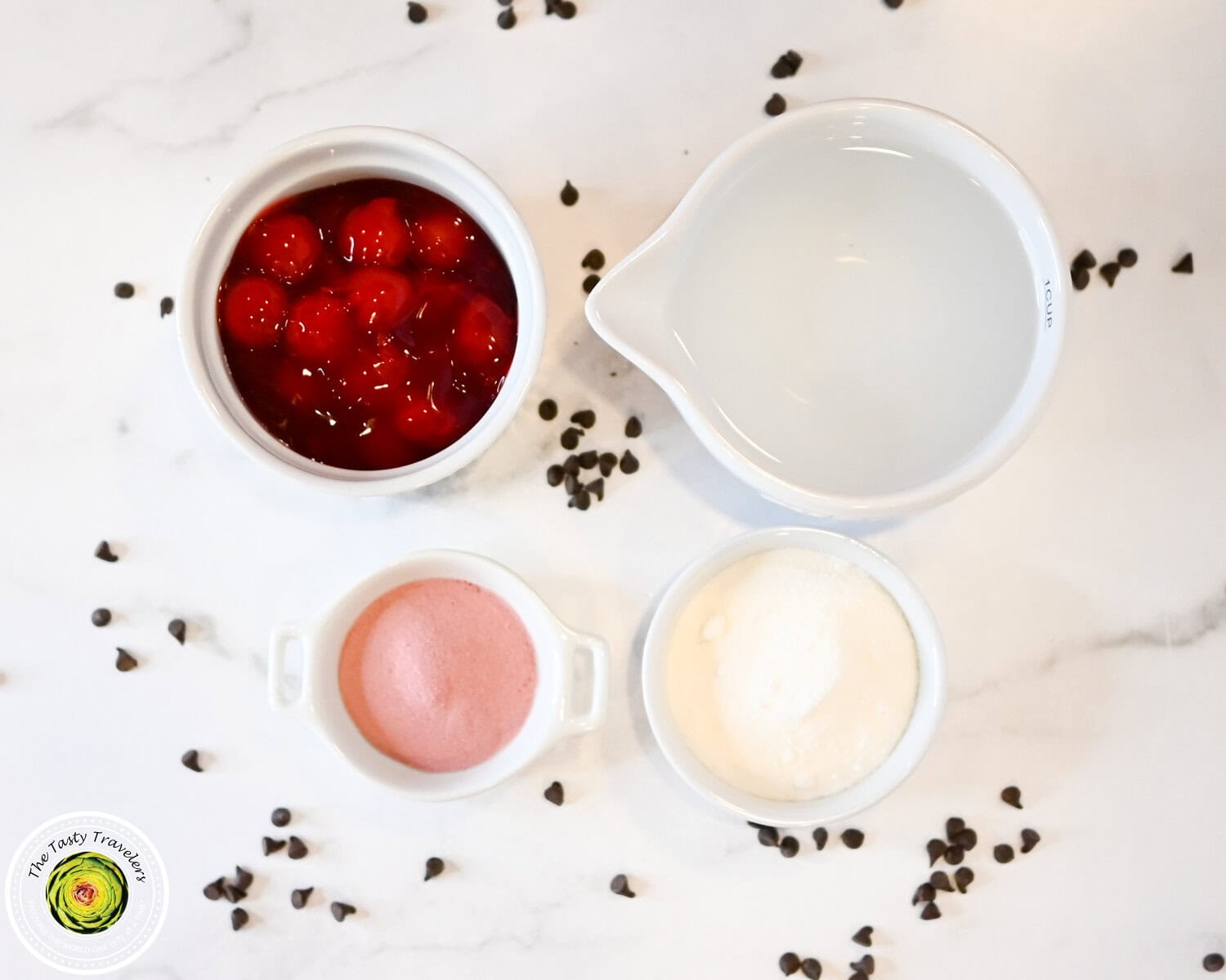 Ingredients for Ninja Creami low calorie cherry chocolate chip sorbet including canned no sugar added cherry pie filling, water, allulose, sugar free cherry Jell-O mix, and mini chocolate chips