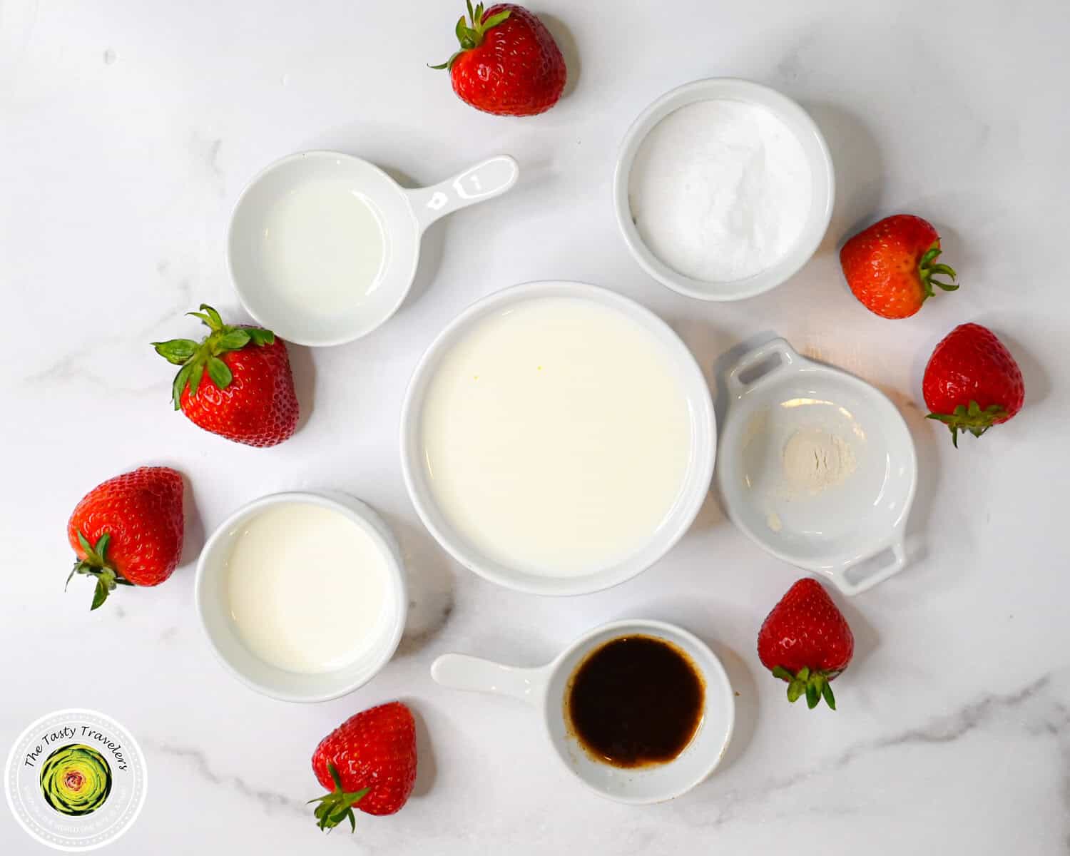 Ingredients for Ninja Creami low calorie strawberry ice cream including 2% milk, half and half, allulose, vanilla bean paste, lemon juice, fresh strawberries, and guar gum