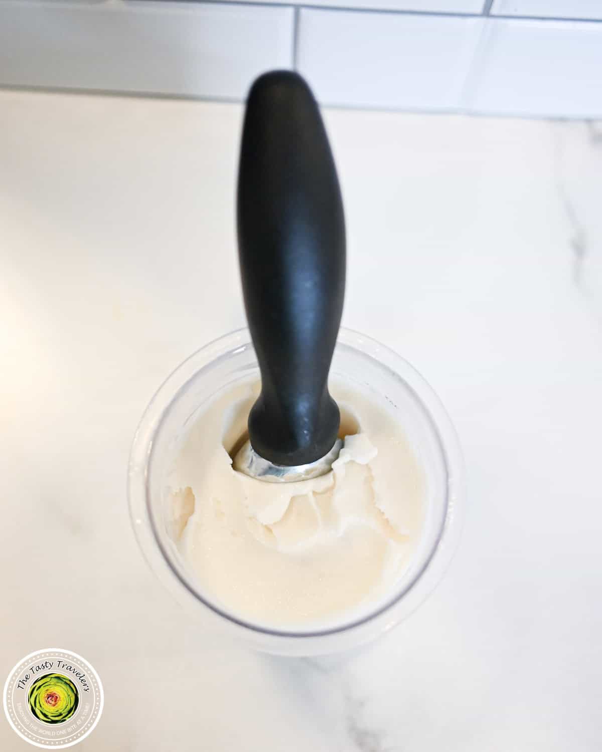 Scooped Ninja Creami low calorie marshmallow ice cream with visible marshmallow fluff pieces