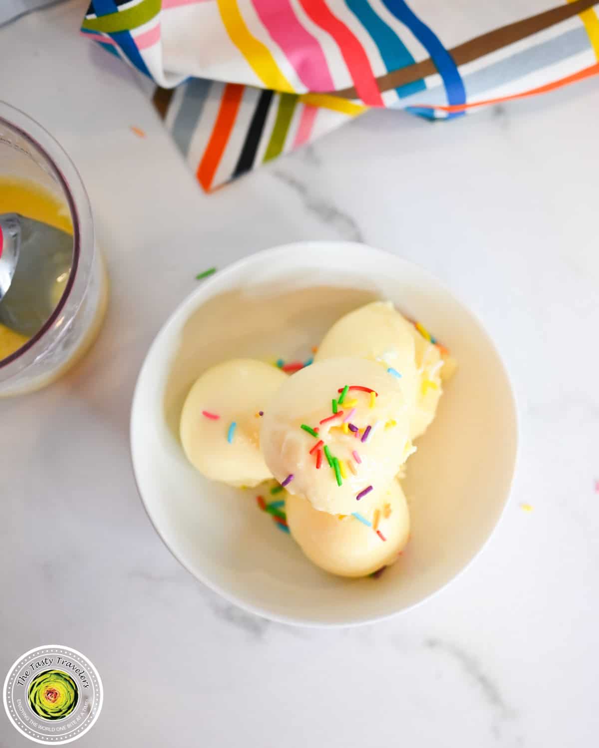 Scoop of Ninja Creami low calorie birthday cake ice cream in a bowl