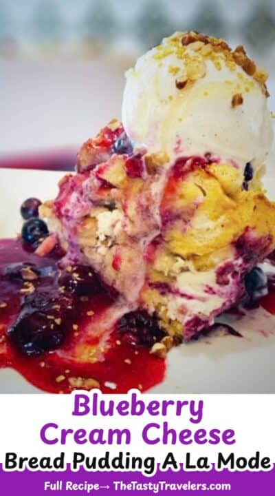 Delicious blueberry cream cheese dessert with ice cream and berry sauce.